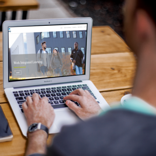 Man using laptop to login to CareerVIU